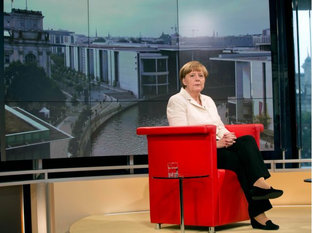 «Ναι» σε αναδιάρθρωση του χρέους, «όχι» σε κούρεμα λέει η Μέρκελ